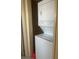 Stackable white washer and dryer set in a small space at 4454 W Desert Inn Rd # B, Las Vegas, NV 89102
