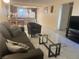 Inviting living room featuring tile floors, neutral walls and natural light at 4454 W Desert Inn Rd # B, Las Vegas, NV 89102
