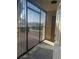 Patio features security bars, door to exterior, and concrete floor at 4454 W Desert Inn Rd # B, Las Vegas, NV 89102