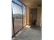 Enclosed patio features security bars and access to outdoor space at 4454 W Desert Inn Rd # B, Las Vegas, NV 89102
