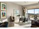 Contemporary dining room with stylish decor, modern lighting fixture, and expansive views at 515 Serenity Point Dr, Henderson, NV 89012