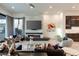 Bright and modern living room featuring a fireplace, modern decor, and open layout at 515 Serenity Point Dr, Henderson, NV 89012