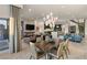 Open-concept living space with modern decor, fireplace, and seamless access to outdoor living at 515 Serenity Point Dr, Henderson, NV 89012