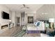 Elegant main bedroom featuring a fireplace, sitting area, and access to ensuite bathroom at 515 Serenity Point Dr, Henderson, NV 89012