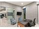Home office featuring contemporary furniture, geometric wallpaper, and sliding glass doors at 515 Serenity Point Dr, Henderson, NV 89012