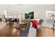 Inviting living space with wood flooring and views into the dining area at 5448 Cove Point Dr, Las Vegas, NV 89130