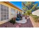 Back patio with an outdoor eating area and room for a grill, great for entertaining at 5448 Cove Point Dr, Las Vegas, NV 89130