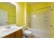 Bathroom features a shower-tub combination, sink, and a medicine cabinet at 5944 Saddle Horse Ave, Las Vegas, NV 89122