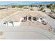 A serene single-story home featuring a desert landscape and a charming red door at 660 Indian Rd, Pahrump, NV 89048