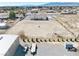 Expansive property featuring a large, flat area and a single-story home in a rural setting with mountain views at 660 Indian Rd, Pahrump, NV 89048