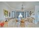 Bright dining room featuring a round table, comfortable seating, and stylish decor at 660 Indian Rd, Pahrump, NV 89048