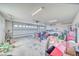 Spacious garage with storage, and a large white car at 660 Indian Rd, Pahrump, NV 89048