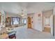 Bright living room featuring plush seating, mirrored closet, and neutral tones at 660 Indian Rd, Pahrump, NV 89048