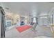 Expansive living room with a fireplace, built-in shelving, and multiple seating areas at 660 Indian Rd, Pahrump, NV 89048