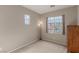 Empty bedroom with carpet flooring, natural light, and neutral walls at 682 Baffin Island Rd, Henderson, NV 89011