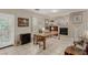 Cozy living room with fireplace, and access to the staircase at 682 Baffin Island Rd, Henderson, NV 89011