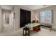 Bright office space with modern desk, neutral walls, and carpeted flooring at 682 Baffin Island Rd, Henderson, NV 89011