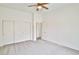 Bright bedroom with large closet and ceiling fan, perfect for relaxing and unwinding after a long day at 694 Tomscott Ave, Henderson, NV 89052