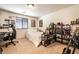 Bedroom with a single bed, desk, guitar and built in shelving at 795 Pickled Pepper Pl, Henderson, NV 89011