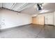 The garage has epoxy floor and cabinets at 795 Pickled Pepper Pl, Henderson, NV 89011