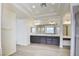 Elegant bathroom featuring double sinks, well-lit vanity, and ample space at 9003 Greek Palace Ave, Las Vegas, NV 89178