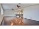 Expansive loft area with gleaming wood floors, a staircase, and bright windows inviting ample natural light at 9003 Greek Palace Ave, Las Vegas, NV 89178