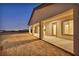 Large covered back patio with sleek design, providing an ideal space for relaxation and outdoor entertainment at 9570 Verde Way, Las Vegas, NV 89149