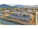 Aerial view of the backyard featuring desert landscaping and mountain views at 9570 Verde Way, Las Vegas, NV 89149