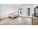 A large bedroom with tile flooring and a walk out door at 9570 Verde Way, Las Vegas, NV 89149