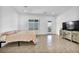 This bedroom has tile flooring and a walk out door at 9570 Verde Way, Las Vegas, NV 89149