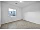 Bedroom with tile flooring and window for natural light at 9570 Verde Way, Las Vegas, NV 89149