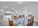 Bright dining room with a table and chairs overlooking the backyard at 9570 Verde Way, Las Vegas, NV 89149
