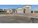 Charming home featuring a three-car garage and xeriscaping for low maintenance at 9570 Verde Way, Las Vegas, NV 89149