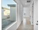 Bright hallway with tile flooring and view of backyard at 9570 Verde Way, Las Vegas, NV 89149