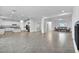 Open floor plan with dining area, living space, and kitchen perfect for entertaining at 9570 Verde Way, Las Vegas, NV 89149