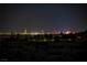 A night view of the Las Vegas skyline from the backyard at 9570 Verde Way, Las Vegas, NV 89149