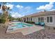 Backyard pool with a spa, a patio, and outdoor seating at 9668 Doraville Ave, Las Vegas, NV 89149