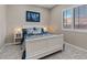 Comfortable bedroom featuring stylish decor and natural light at 9668 Doraville Ave, Las Vegas, NV 89149
