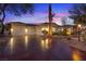 Stunning exterior of home with three-car garage and desert landscaping at 9668 Doraville Ave, Las Vegas, NV 89149