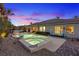 Backyard oasis featuring a pool, spa, and cozy seating areas at 9668 Doraville Ave, Las Vegas, NV 89149