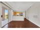 Open kitchen with stainless appliances and view of the balcony at 10120 Cedar Key Ave # 201, Las Vegas, NV 89129