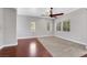 A bright living room with hardwood flooring and large windows at 10120 Cedar Key Ave # 201, Las Vegas, NV 89129
