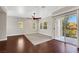 A living room showing view of the balcony and large windows at 10120 Cedar Key Ave # 201, Las Vegas, NV 89129
