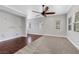 A bright living room with hardwood flooring and large windows at 10120 Cedar Key Ave # 201, Las Vegas, NV 89129