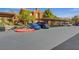 Community parking area with assigned covered spots for residents at 10120 Cedar Key Ave # 201, Las Vegas, NV 89129