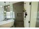 Modern bathroom featuring a soaking tub, walk-in shower with elegant tile, and stylish fixtures at 10323 Hardy Falls St, Las Vegas, NV 89141