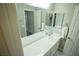 Bathroom with double sink vanity and framed mirror at 10323 Hardy Falls St, Las Vegas, NV 89141