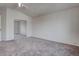 Spacious bedroom featuring carpet flooring and a mirrored closet door at 10478 Beallsville St, Las Vegas, NV 89141