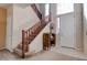 Bright foyer with a staircase, tiled flooring, and natural light from the windows at 10478 Beallsville St, Las Vegas, NV 89141