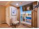 Bedroom seating area with city views, soft neutral tones and modern decor at 125 E Harmon Ave # 2801&2803, Las Vegas, NV 89109